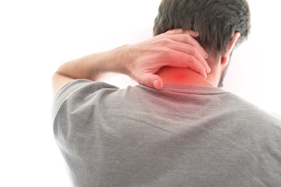 Man Suffering From Neck Pain — Fair Oaks, CA — Corner Chiropractic Center