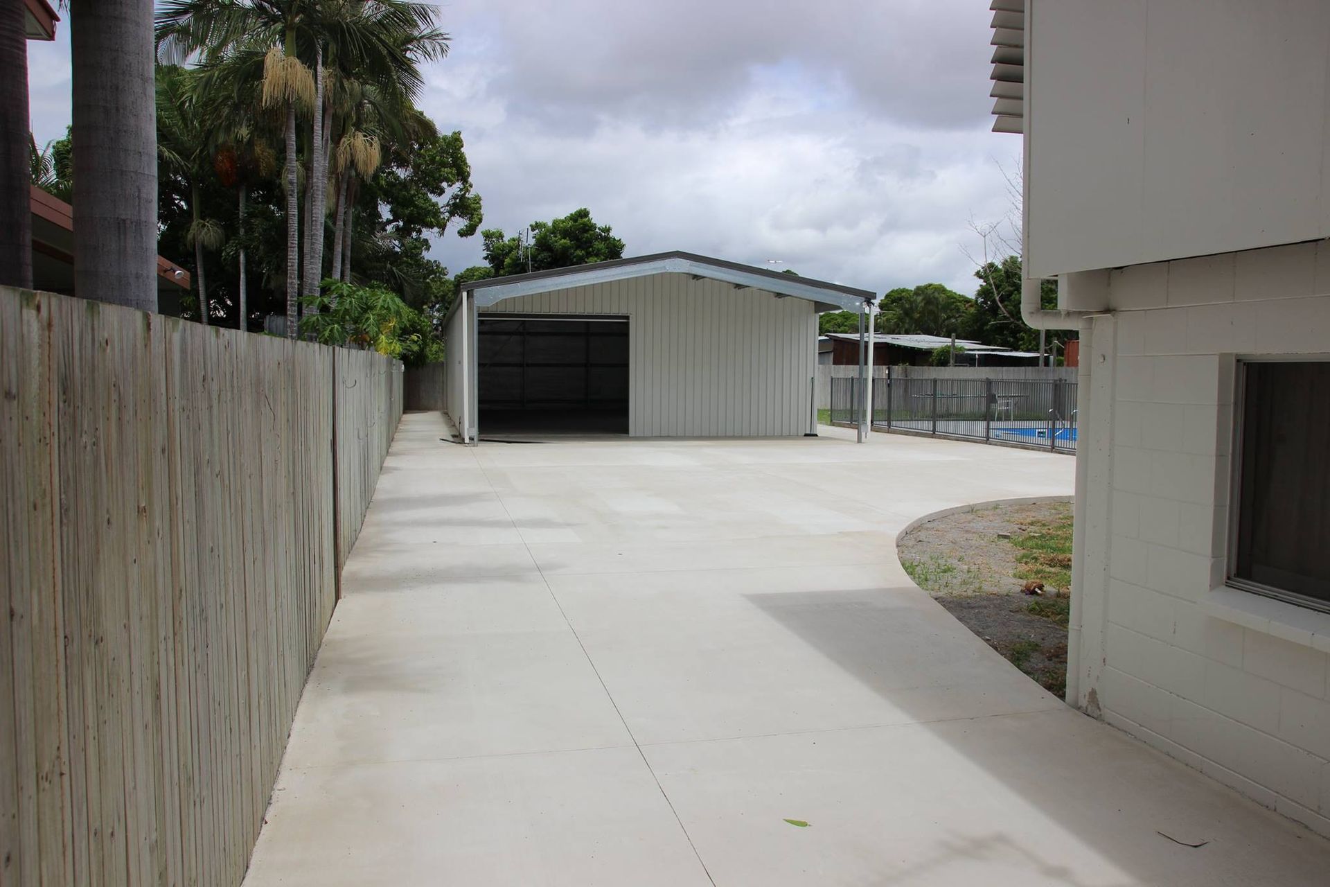 Driveway and Path Leading to Shed — Experienced Concreter in Mount Low, QLD