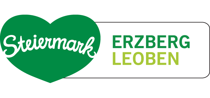 Logo mit dem grünen Steiermark Herz und dem Schriftzug Erzberg Leoben