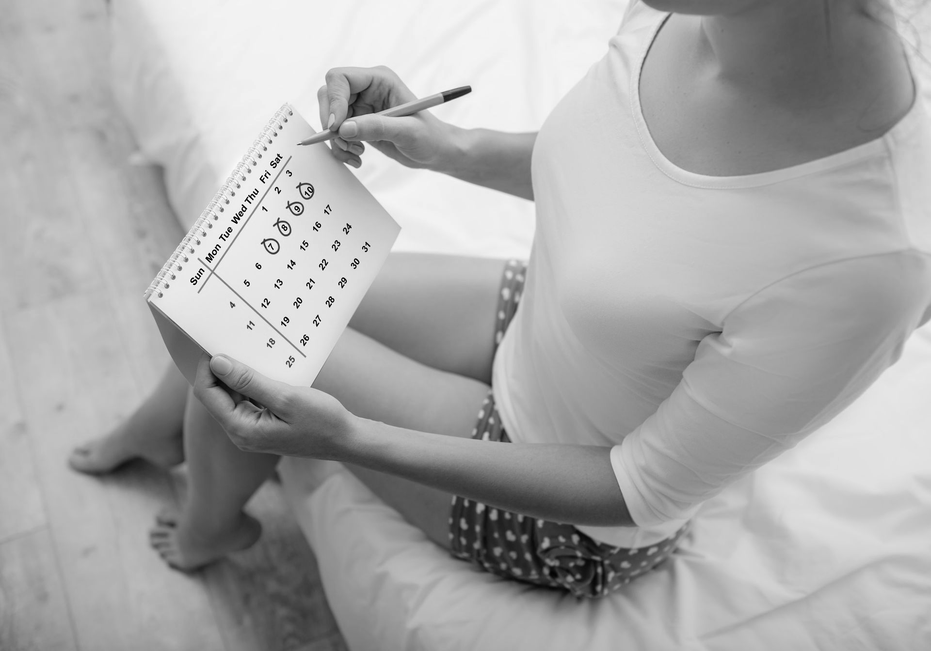 Woman tracking the best day of fertile window to conceive.