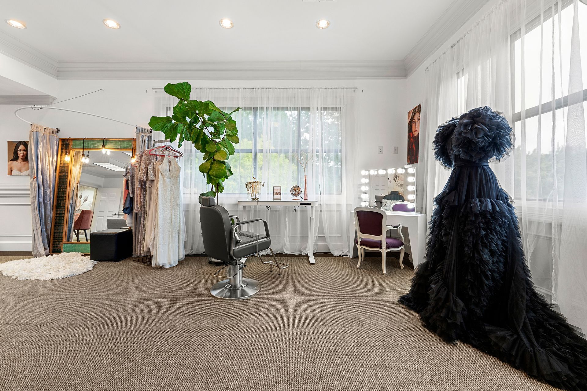 A room with a black dress and a chair in it.