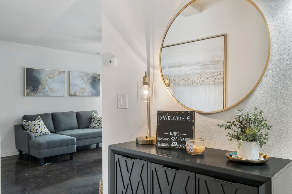 Open-concept living room with natural light in Tulsa apartment