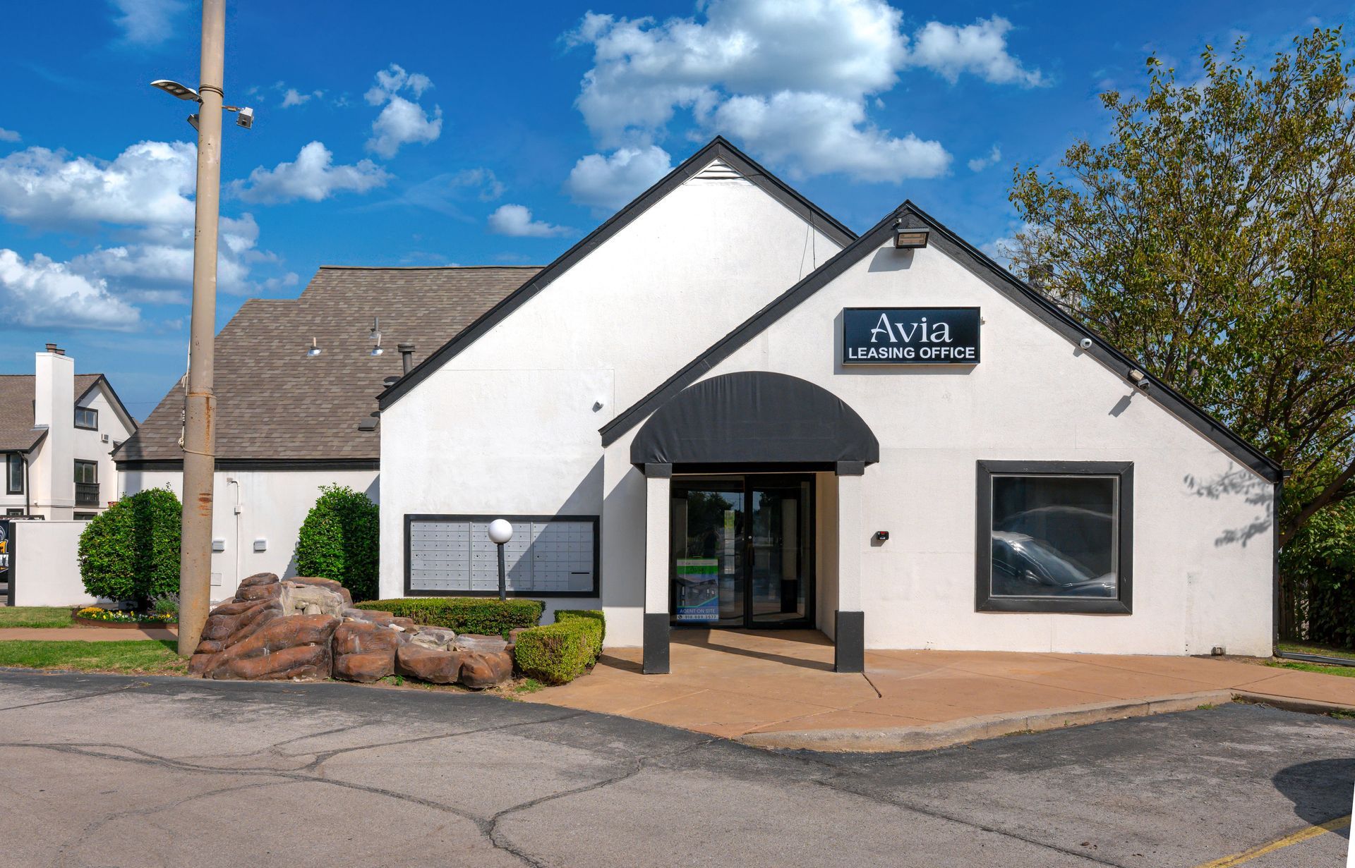 Keys being handed to a tenant during the leasing process for a single-family rental home in Tulsa, representing professional tenant placement and lease management by KSA Property Management