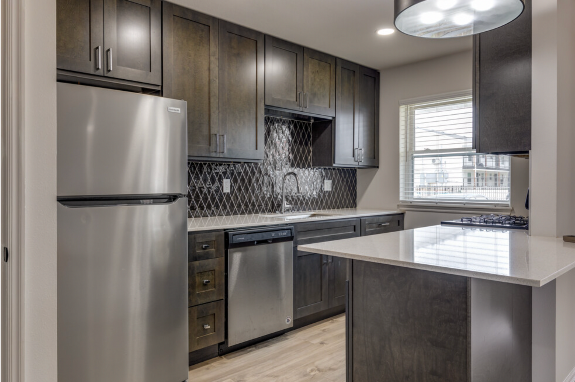 Spacious modern apartment interior in Tulsa, Oklahoma with floor-to-ceiling windows, sleek hardwood floors, and minimalist furnishings
apartments management lease lease management asset management gated community bathroom management map community lease community apartments apartments property map