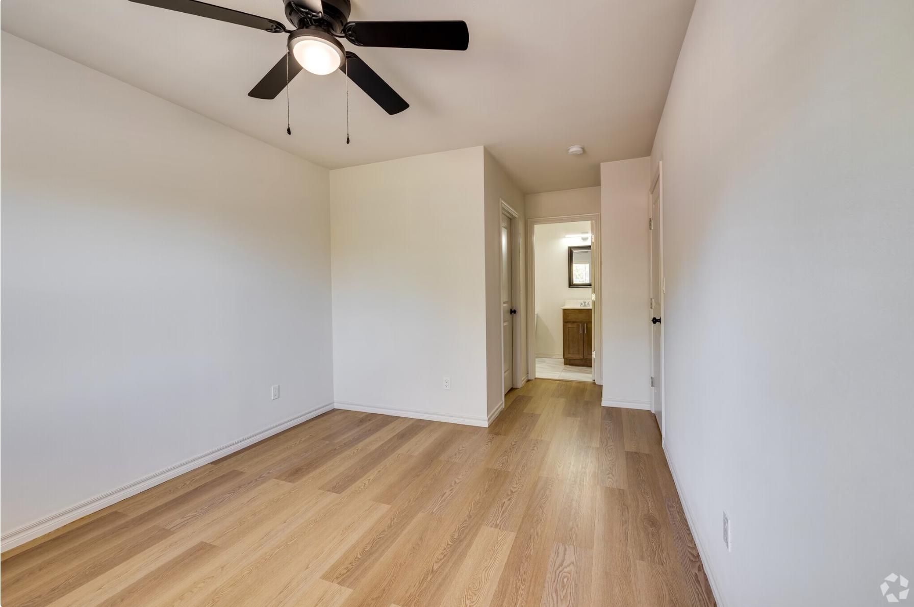 Spacious master bedroom with walk-in closet in Tulsa rental