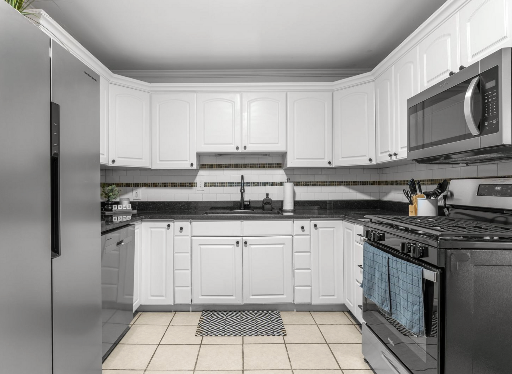 Keys being handed to a tenant during the leasing process for a single-family rental home in Tulsa, representing professional tenant placement and lease management by KSA Property Management