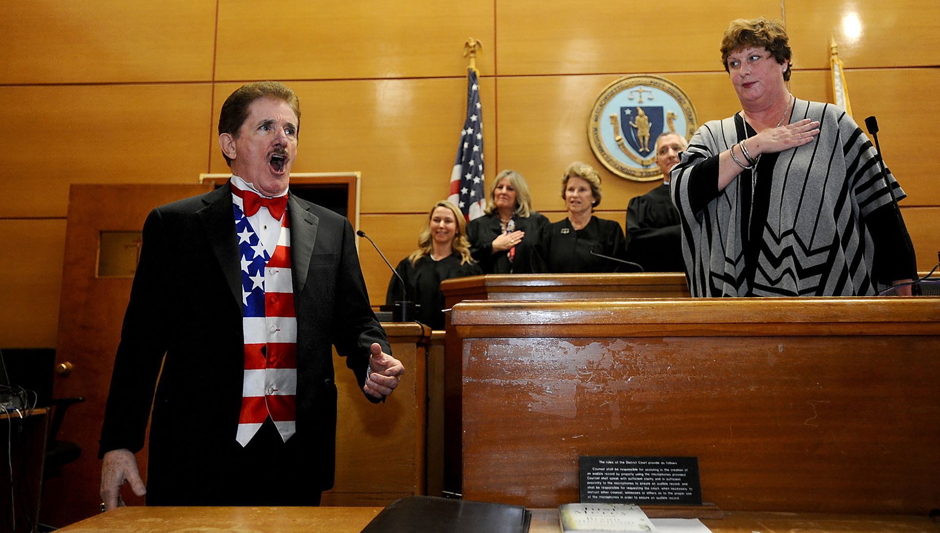 Famed Boston Bruins national anthem singer Rene Rancourt starts Law Day at Framingham District Court with his rendition of the