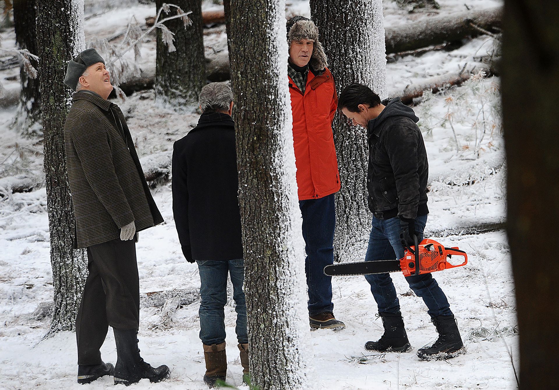 Hollywood A-list actors (from left) John Lithgow, Mel Gibson, Will Ferrell and Mark Wahlberg pause from filming a scene for