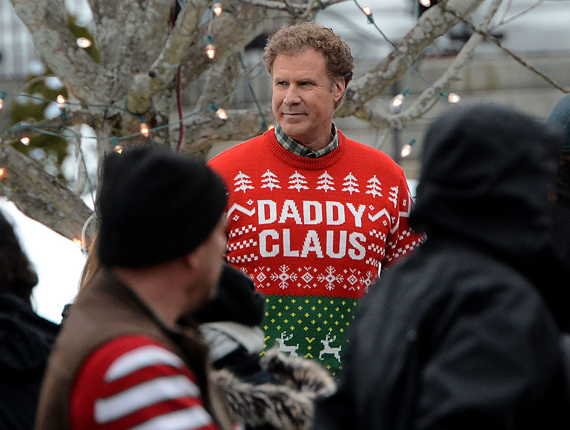Will Ferrell stands on the set of his Christmastime comedy