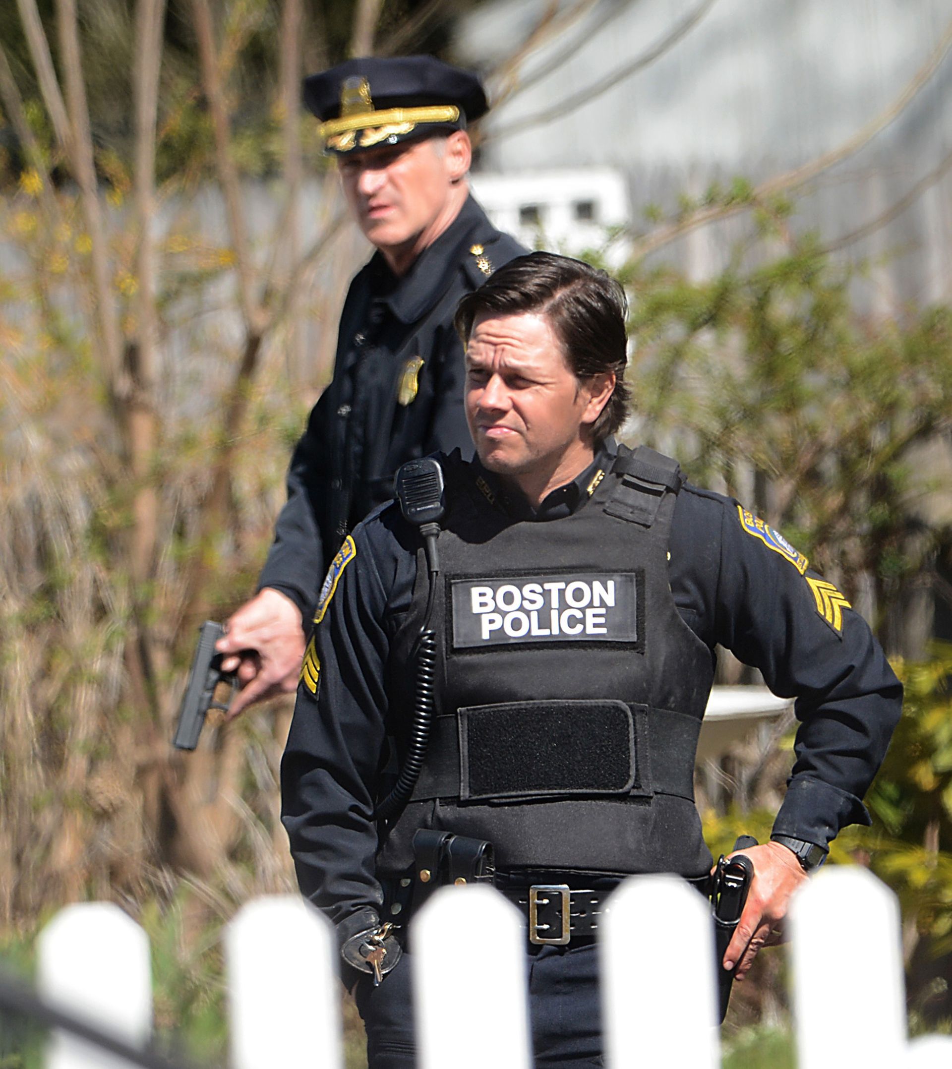 Mark Wahlberg, front, films a scene for the Boston Marathon Bombing film “Patriots Day