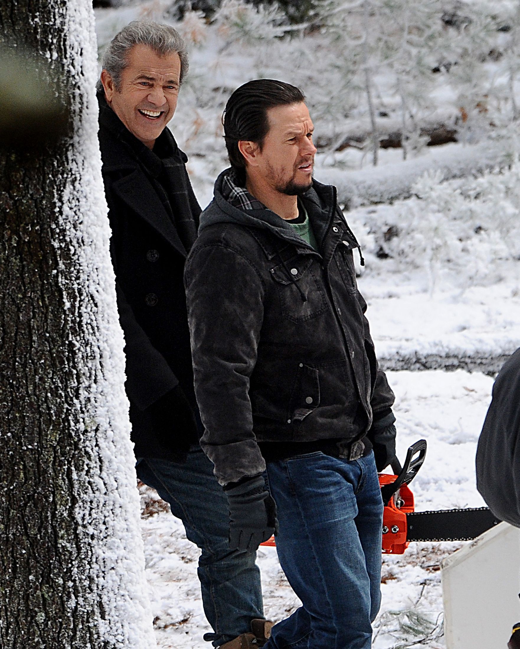 Mark Wahlberg, right, is followed by Mel Gibson while filming a scene for