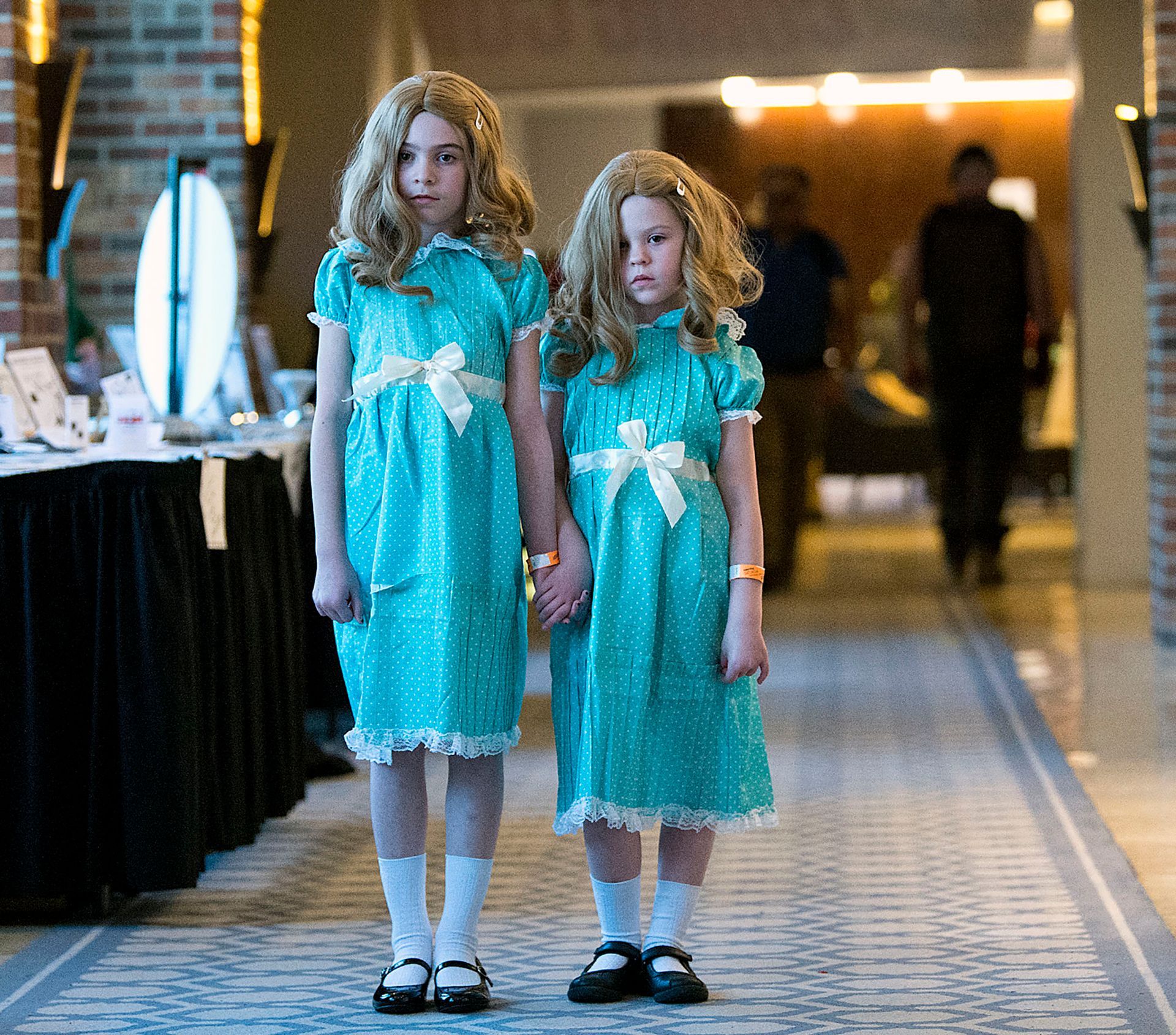 Portraying the Grady Twins from 1980 horror classic