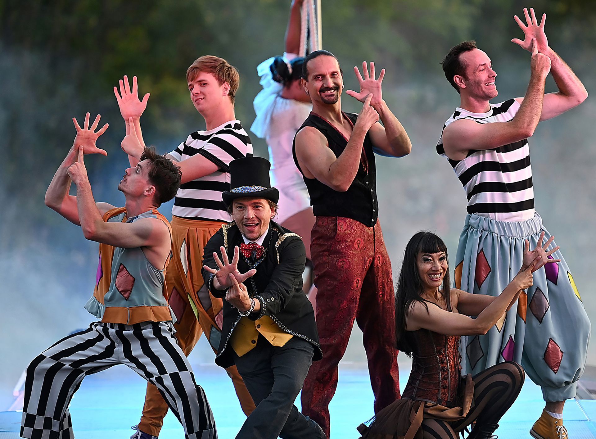 The Stars Above cast gathers on stage during a during an evening performance of the open air circus, at Eastleigh Farm in Framingham, August 12, 2022.