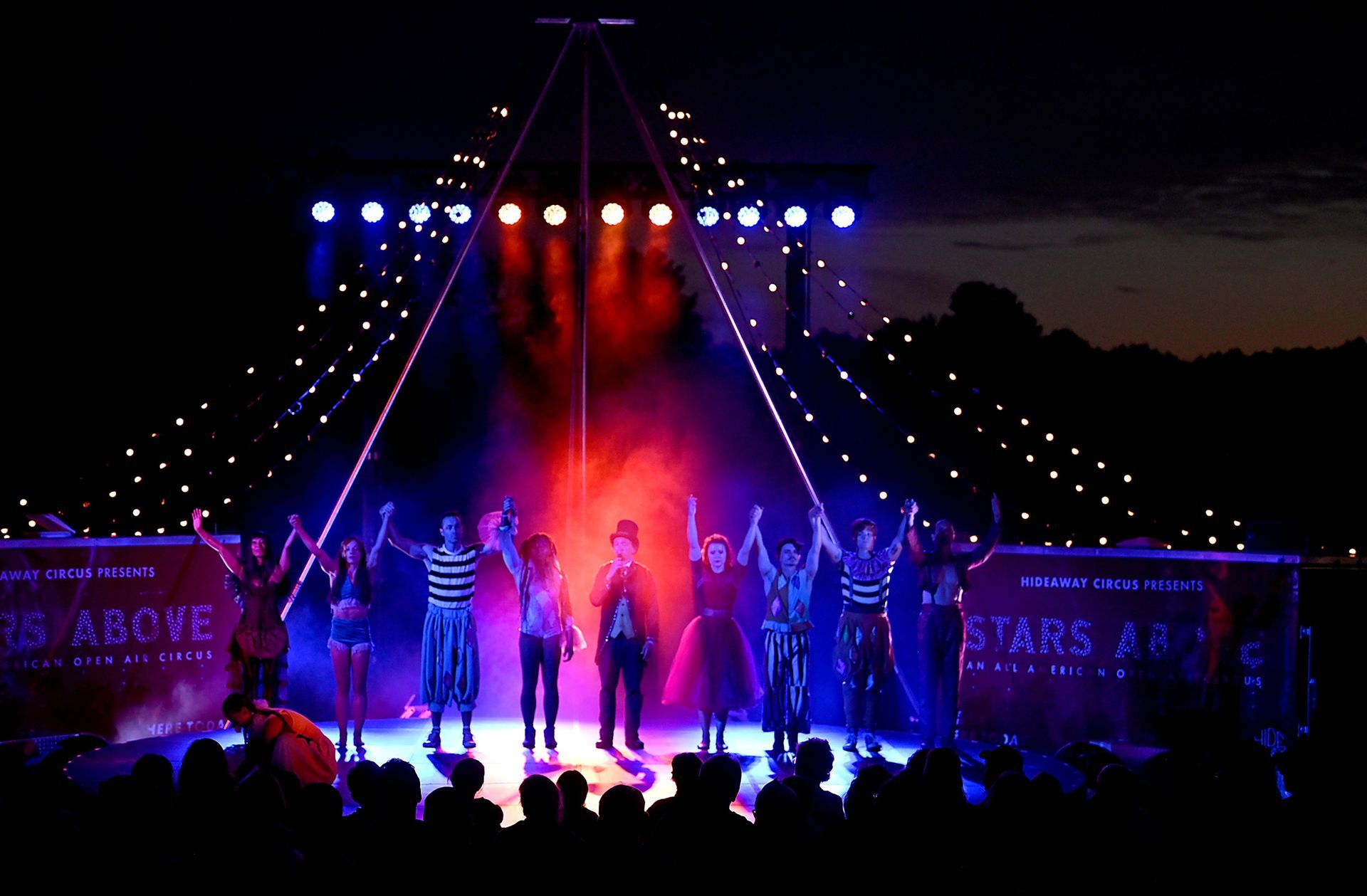 The Hideaway Circus troupe takes a bow at the conclusion of an evening performance of Stars Above open-air circus, at Eastleigh Farm in Framingham, August 12, 2022.