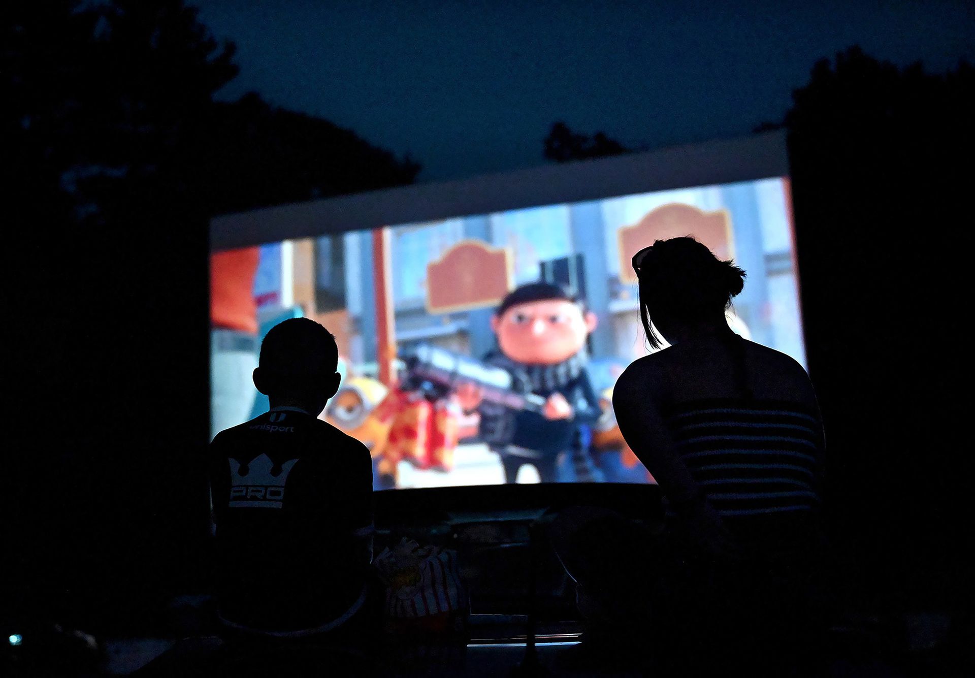 Mille Thomsen, 14, and her brother Kasper, 11, watch