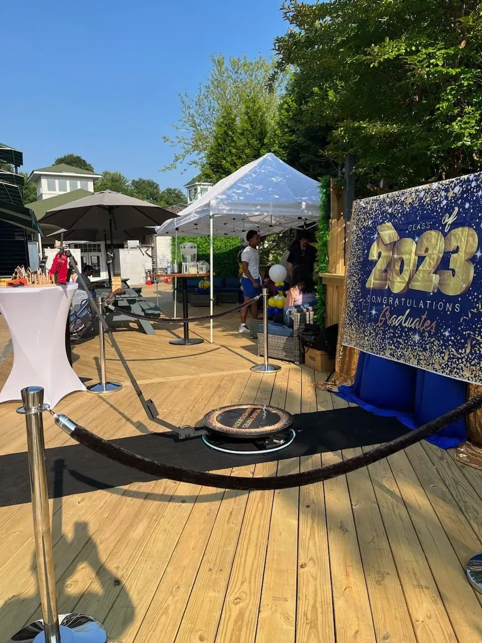 a wooden deck with a sign that says 2023 on it