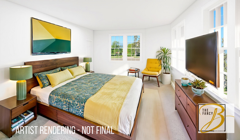 A bedroom with a king size bed , dresser , nightstand , chair and rug.