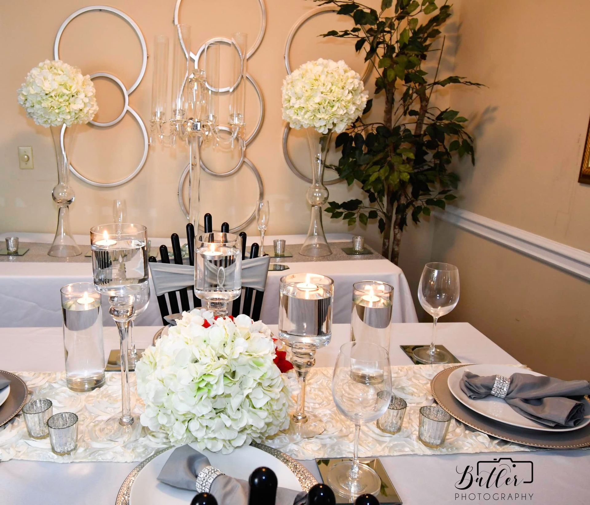 Table Set With Flowers And Candles — Augusta, GA — Sevyn Kreations & Design LLC 