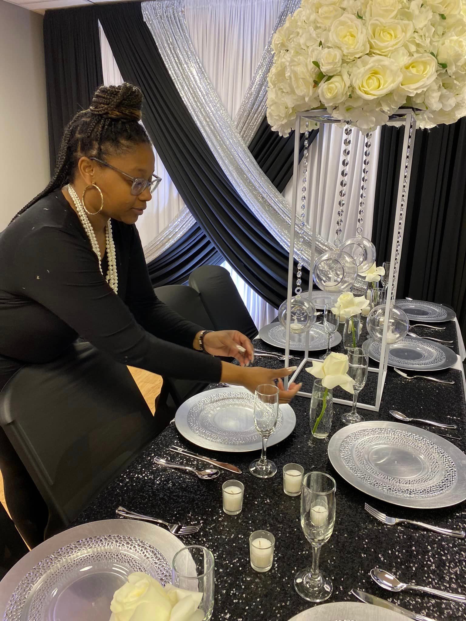 Woman Setting A Table — Augusta, GA — Sevyn Kreations & Design LLC 