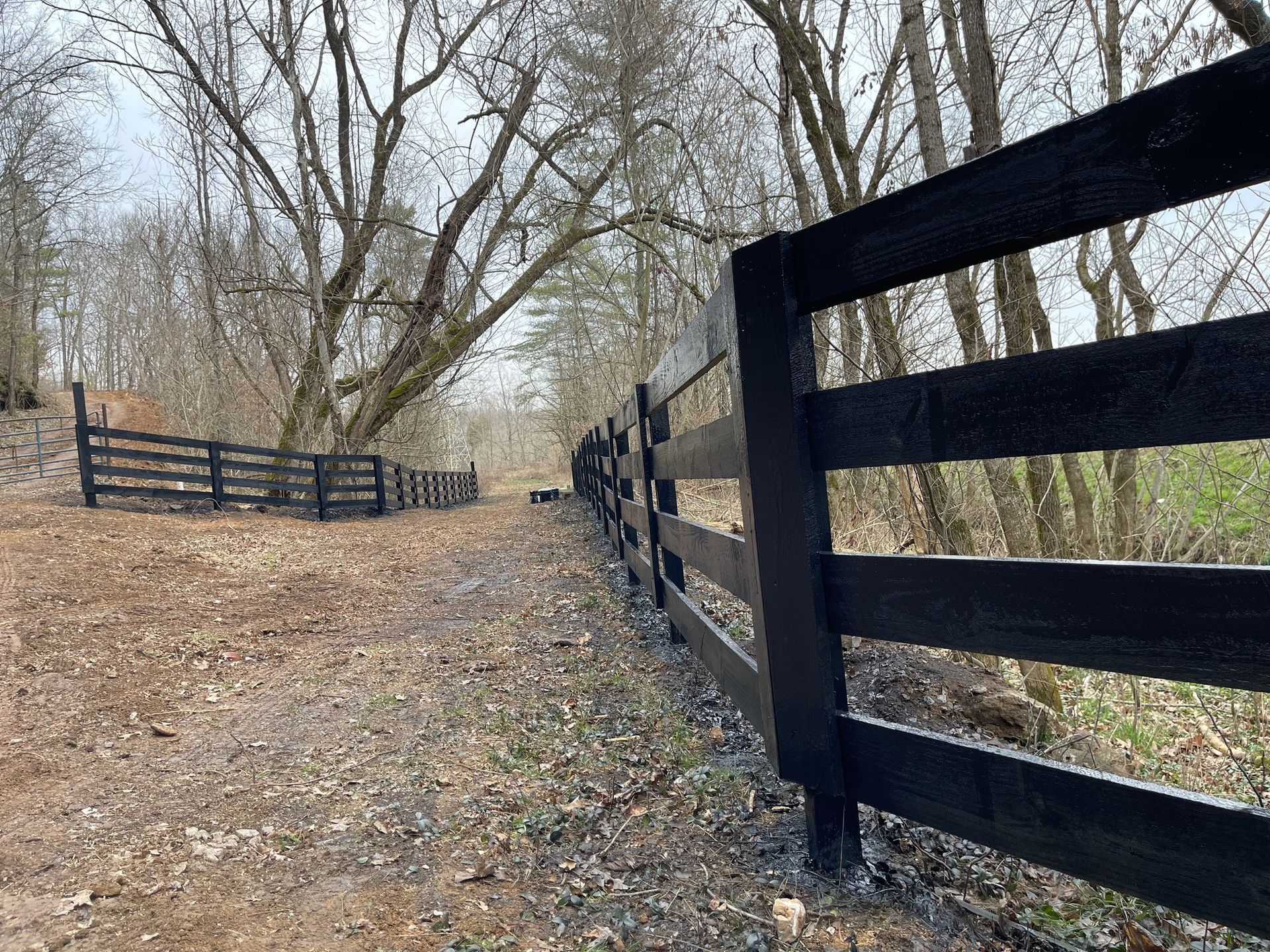 Stained fence installed by Kingdom Fence Company in Columbia, Tennessee, highlighting quality craftsmanship.
