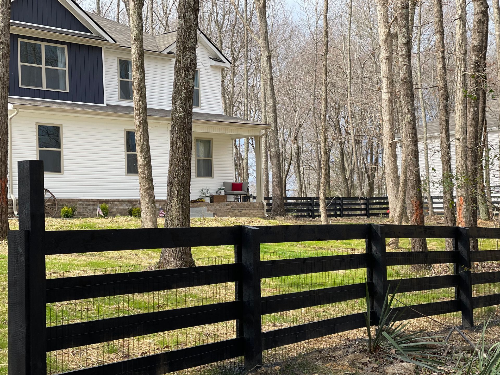 4-board fence installed by Kingdom Fence Company, highlighting classic and sturdy fencing solutions.