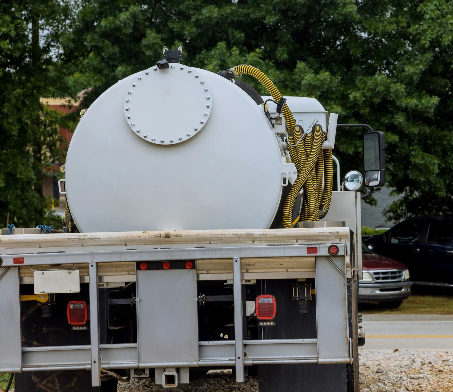 White Truck for Grease Trap Cleaning — Gulfport, MS — Vacuum Services