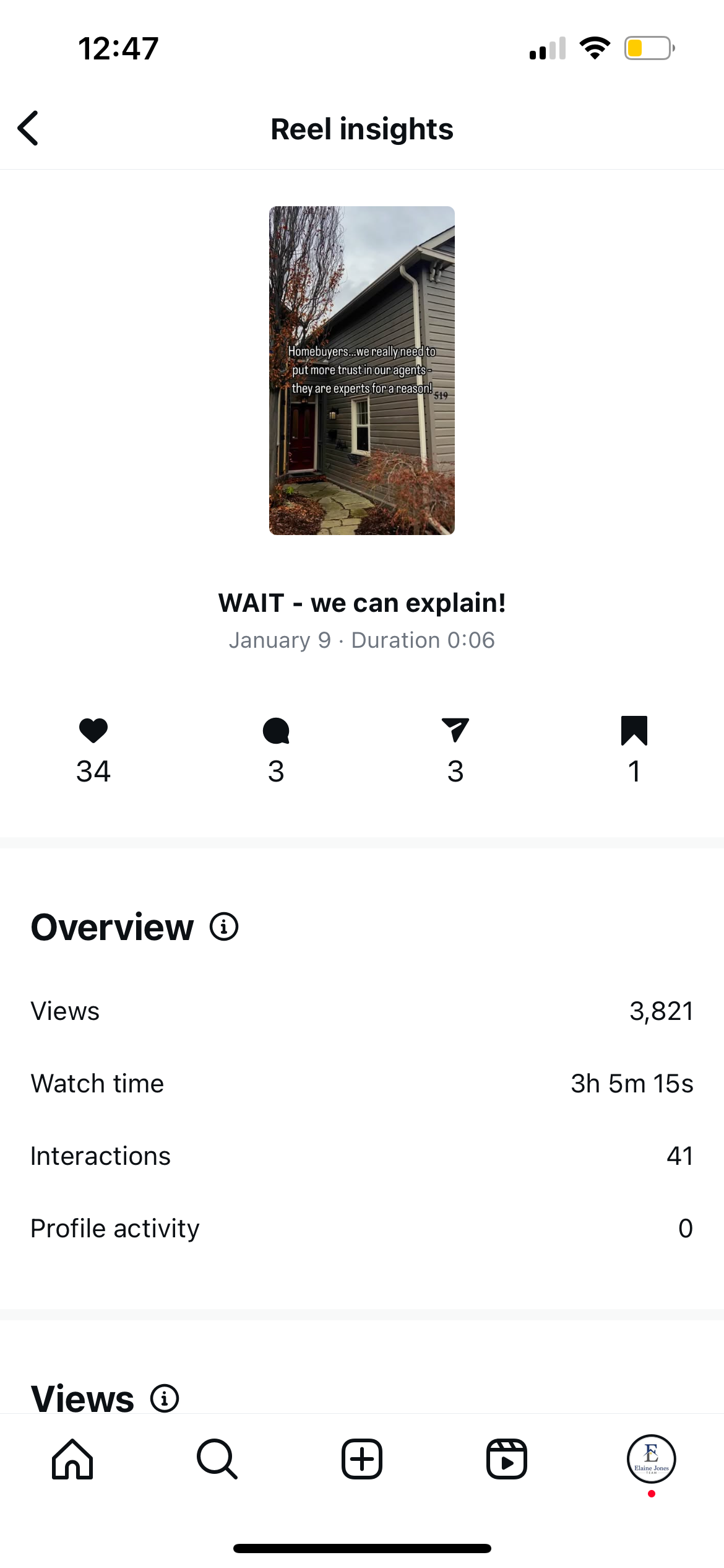 A phone screen shows a picture of a house.