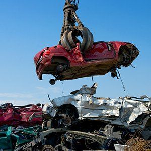 Crane Picking Up Car — Independence, IA — Tournier's Recycling and Auto Salvage