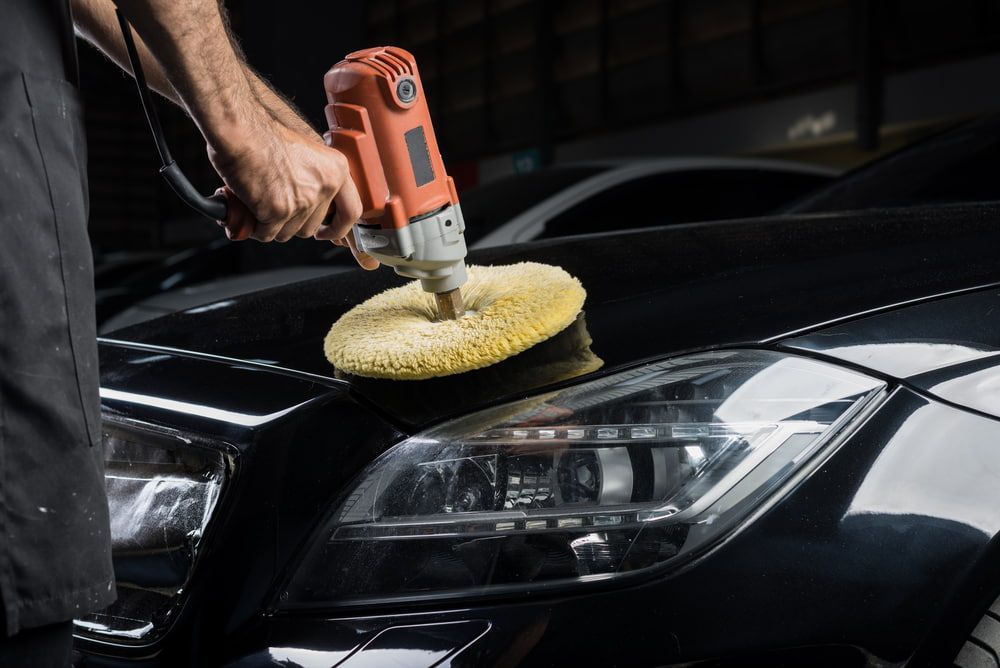 A Person Uses a Tool to Polish the Car — All Mechanical Services in South Murwillumbah, NSW