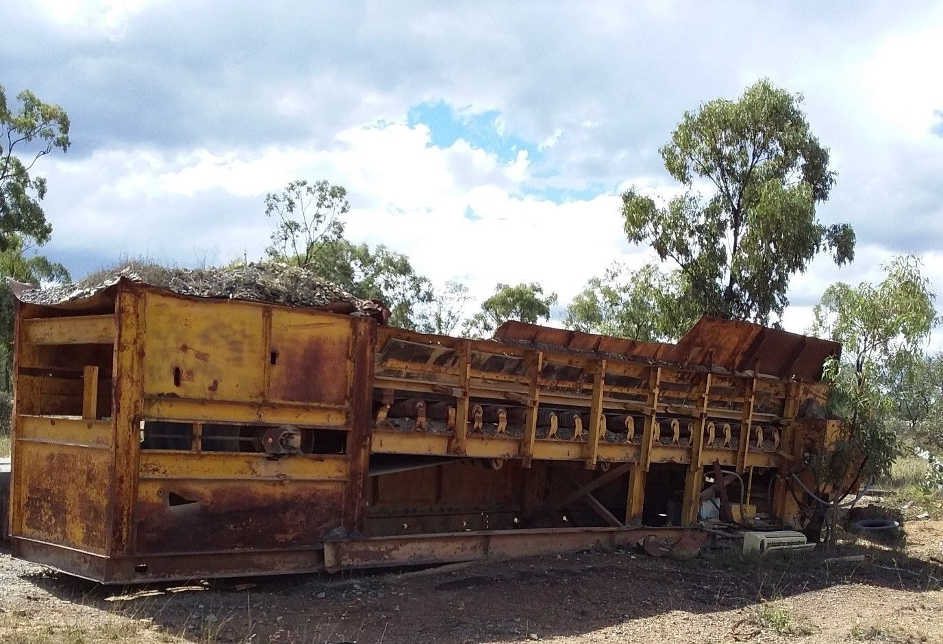 Dump Truck is Being Loaded With Rocks in a Quarry — W Wall & Sons in Nebo, QLD