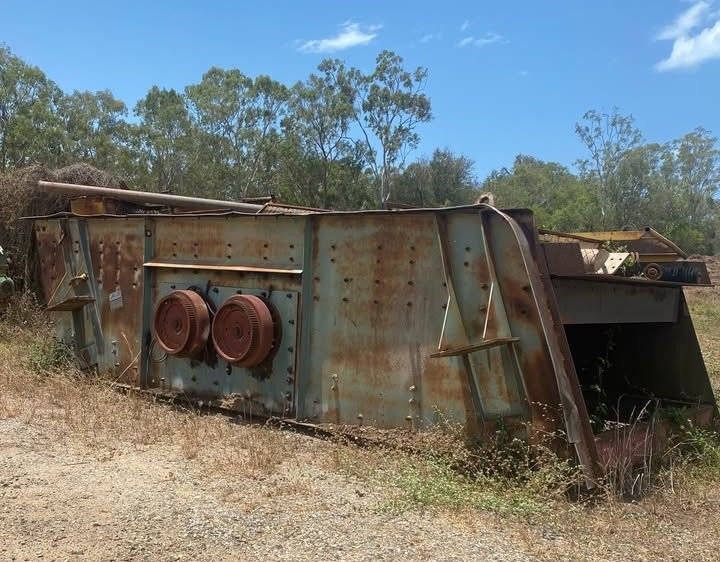 Dump Truck is Being Loaded With Rocks in a Quarry — W Wall & Sons in Nebo, QLD