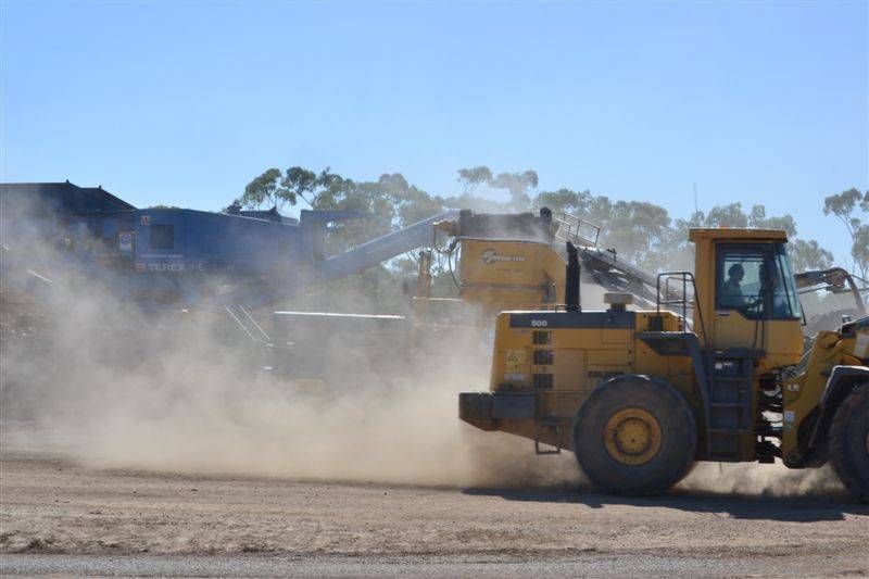 Yellow and Black Machine are making dust — W Wall & Sons in Nebo, QLD