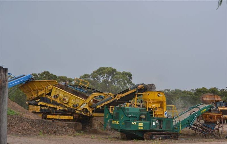 trucks in a quarry— W Wall & Sons In Bloomsbury, QLD