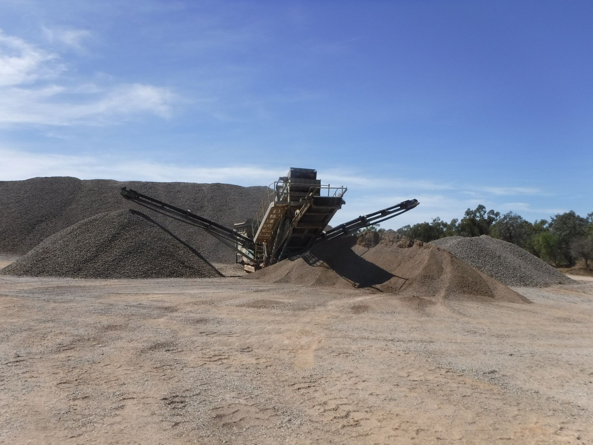 a pile of rocks— W Wall & Sons In Mackay, QLD