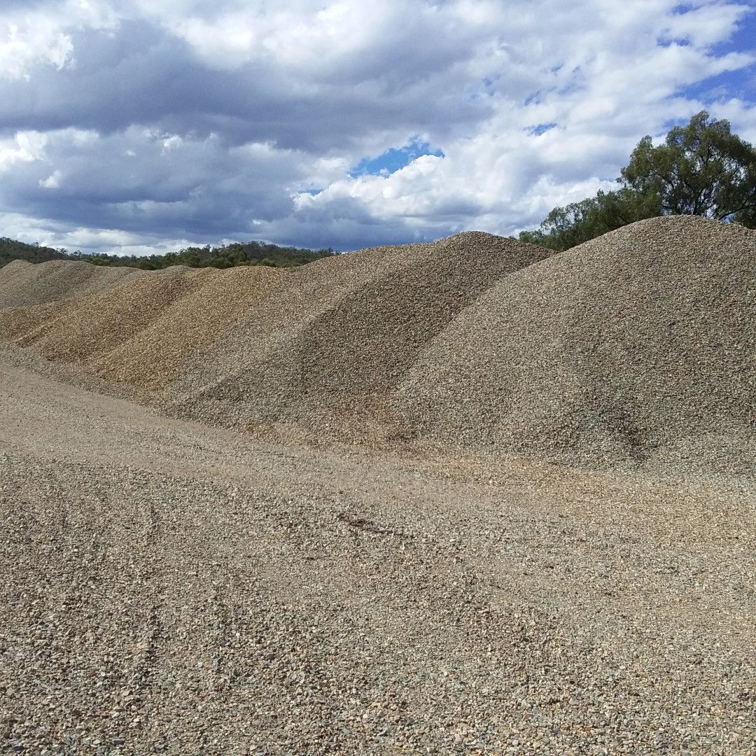 A Dump Truck Is Being Loaded With Coal In A Coal Mine — W Wall & Sons In Mirani, QLD