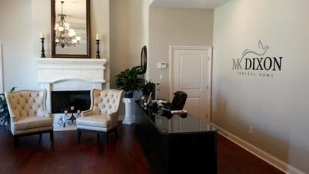 A large office building with a lot of windows on a sunny day.