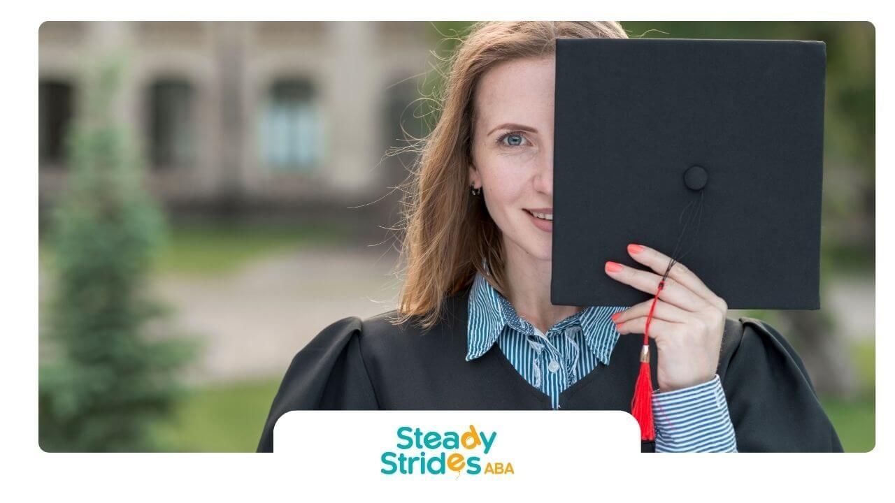 A therapist holding a diploma folder outdoors, representing achievement and educational milestones.