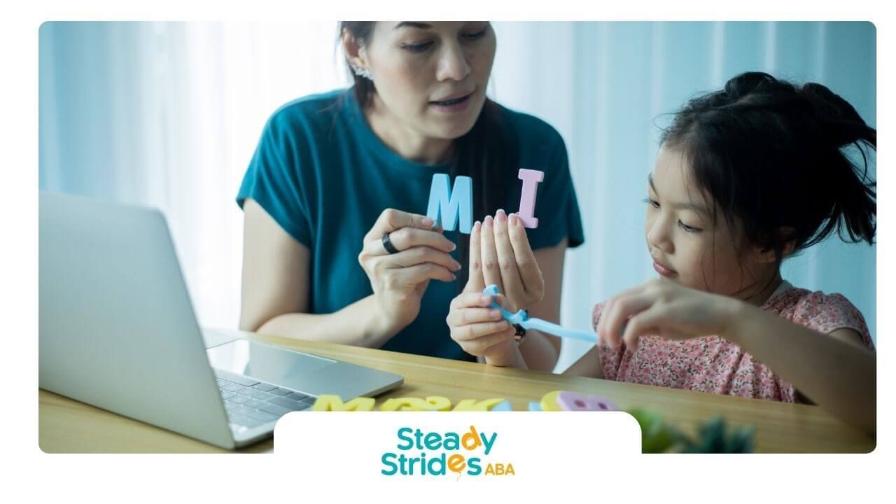 Therapist teaching autistic girl letters with hands-on activity during early learning session.