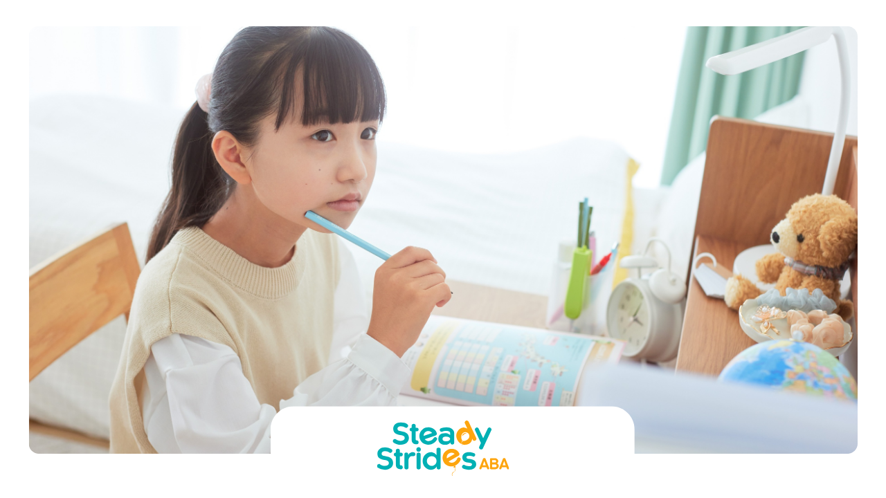 A girl with bangs holding a toothbrush is at a desk, looking thoughtful.