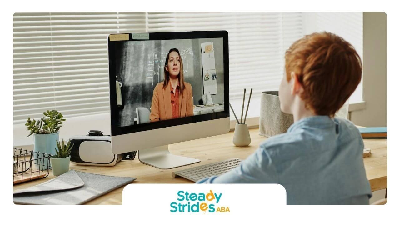 The autistic child participating in an online lesson, engaged in a virtual learning environment.