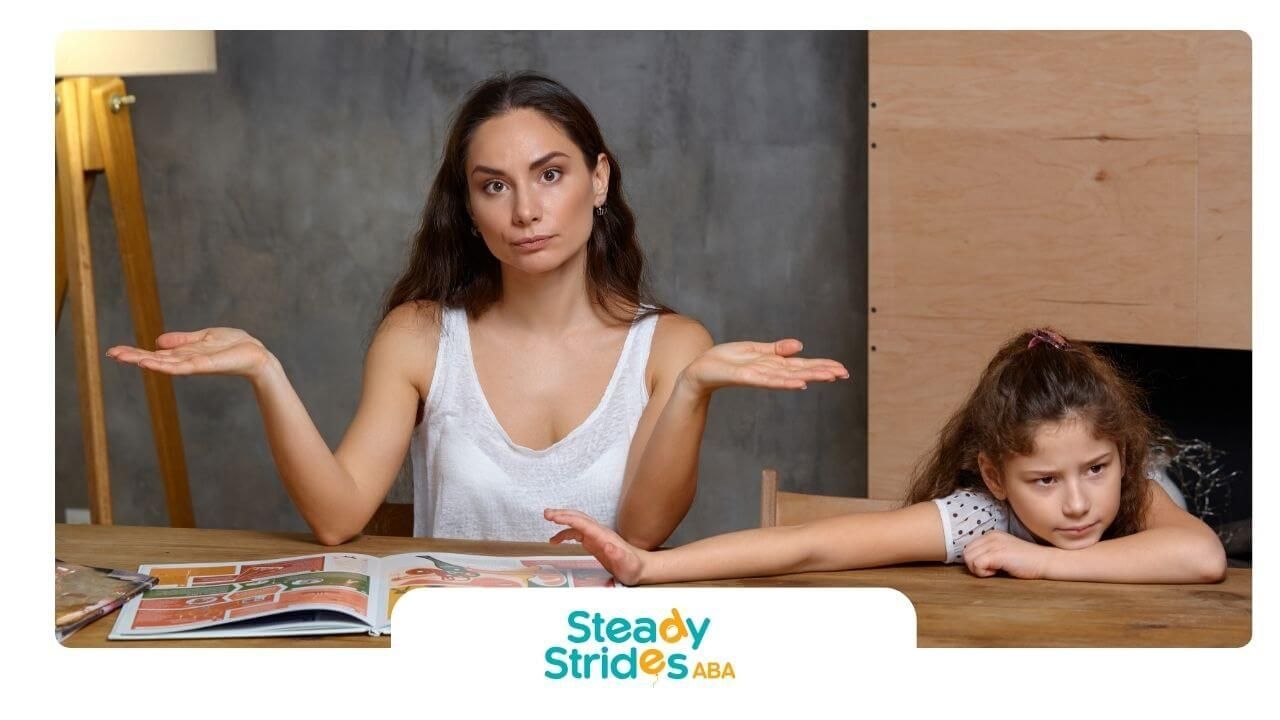 An ABA therapist with autistic girl showing confusion and frustration during home learning.
