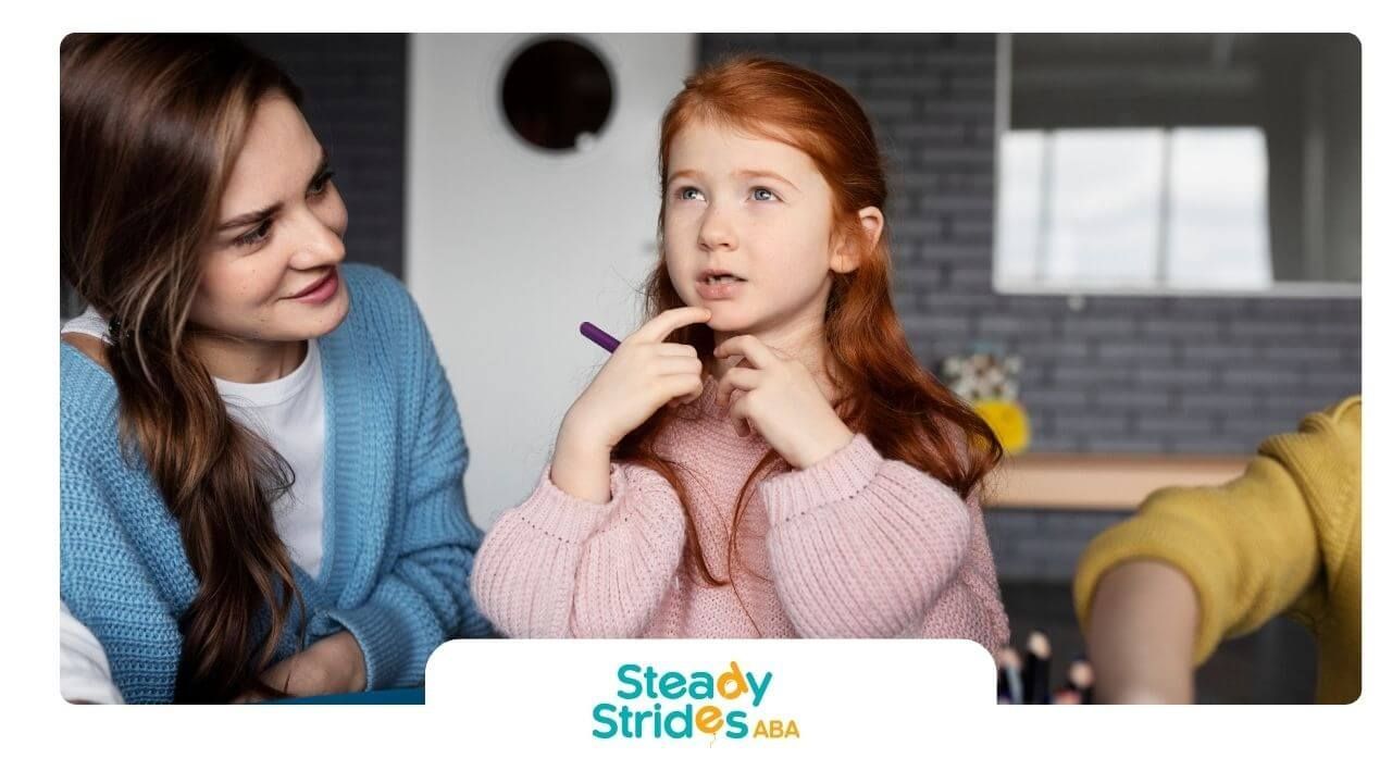 An autistic kid is thinking during a guided learning activity with a therapist nearby in Texas