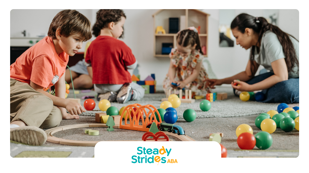 Children and adult play with toys on a carpeted floor indoors.