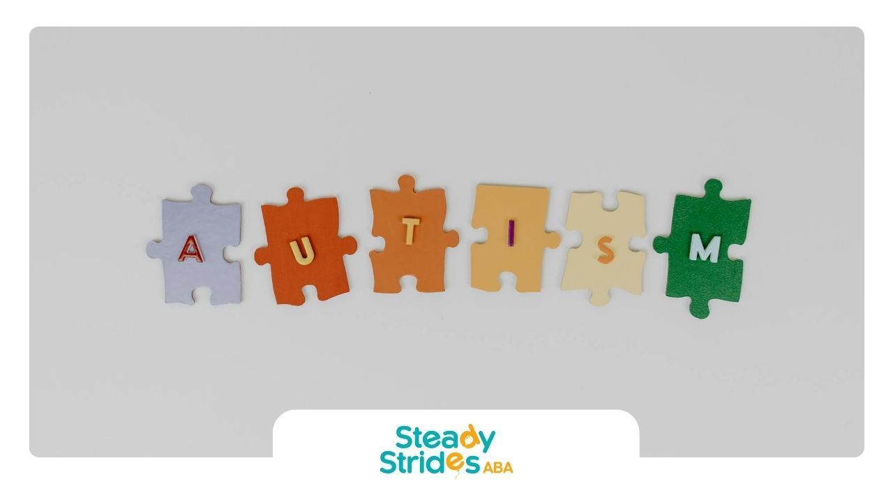 Colorful puzzle pieces spelling out the word “AUTISM” against a white background in Texas.