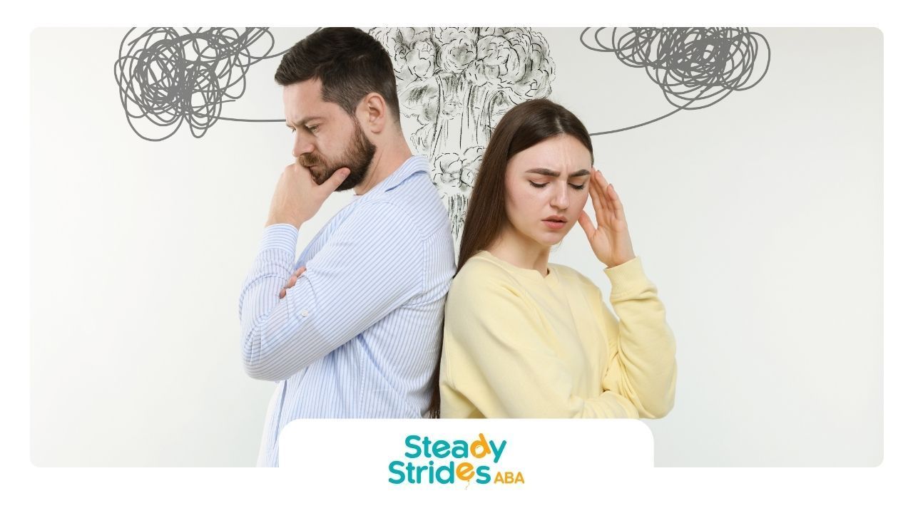 Man and woman stand back-to-back, looking unhappy. Gray scribbles above them suggest tangled thoughts.