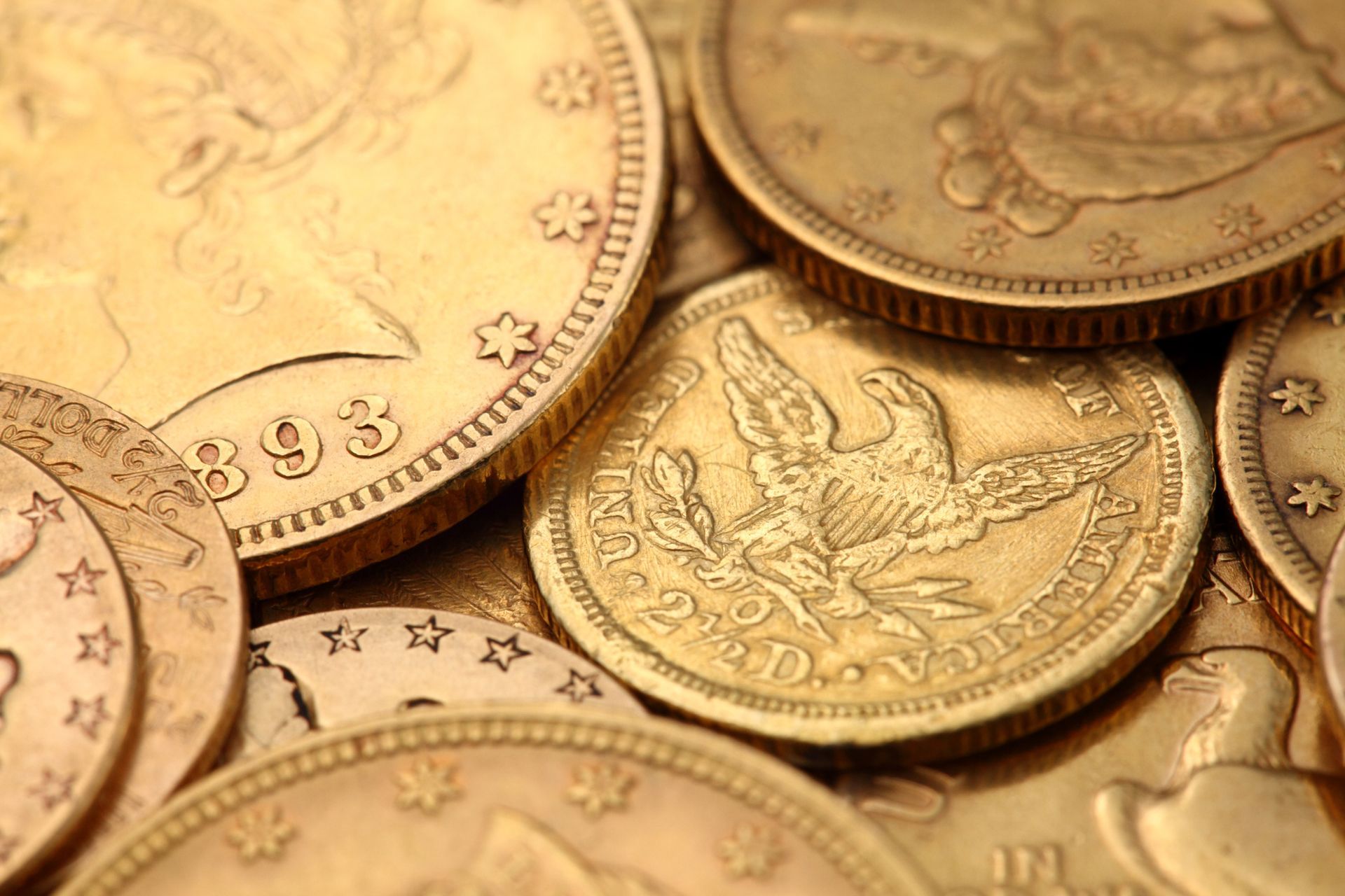 Close-up of overlapping gold coins.
