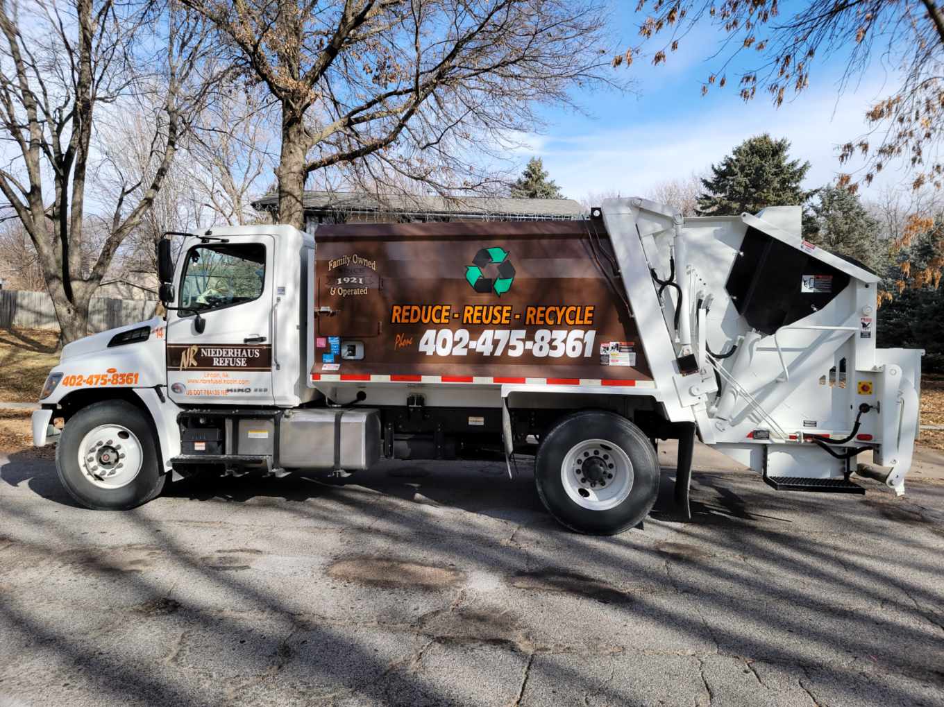 Waste and recycle truck ready for recycling services in Lincoln, NE