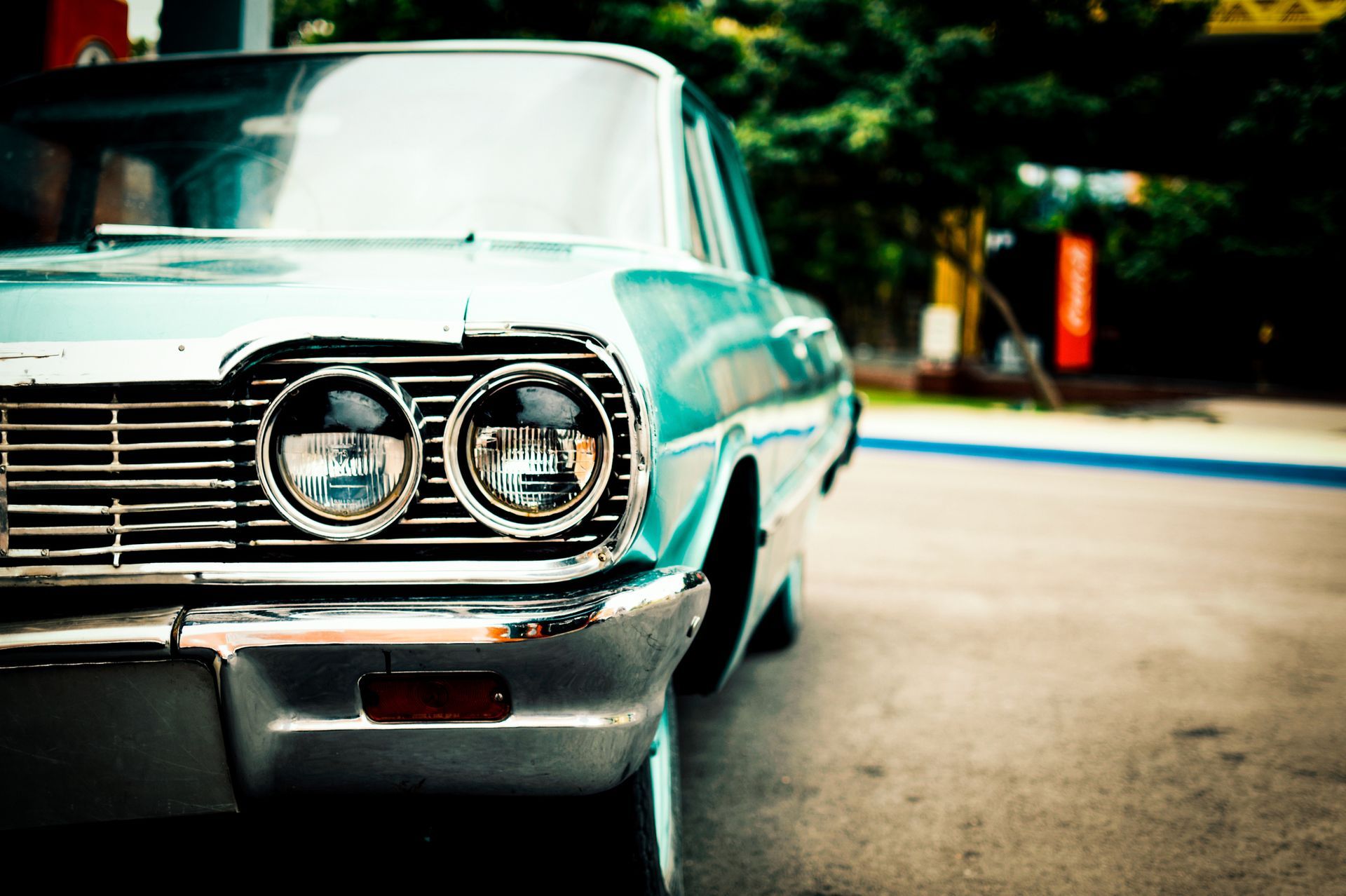 Close-up of a vintage car’s front.