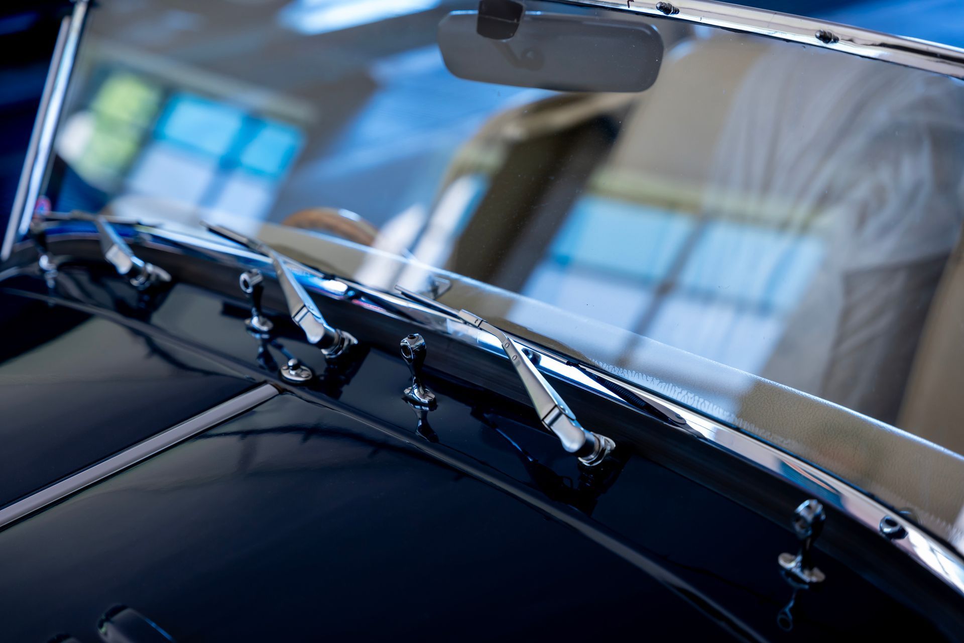 Close view of the windshield of an old classic car. Close view of the windshield of an old classic car.
