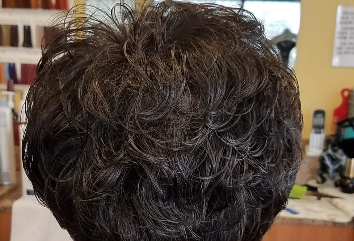 A close up of a person 's hair in a salon